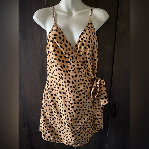 Forever 21 Pants - Forever 21 Black and Tan Animal Print romper